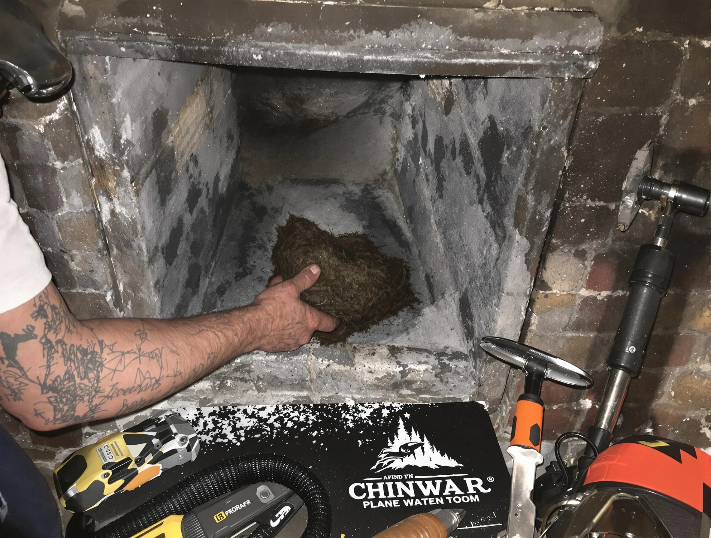 Lincoln Chimney Sweep safely removing debris and screening chimney in Lincoln, AL